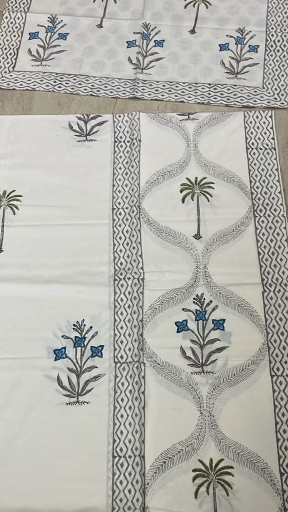 Palm and bloom in blue