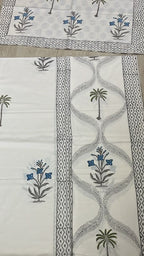 Palm and bloom in blue