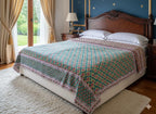 Reversible green and pink bedcover