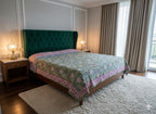 Reversible green and pink bedcover
